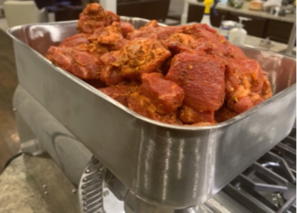 A picture containing indoor, dish, pan, barbecue
Description automatically generated