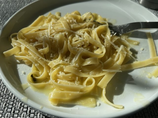 A picture containing food, plate, pasta, dish

Description automatically generated